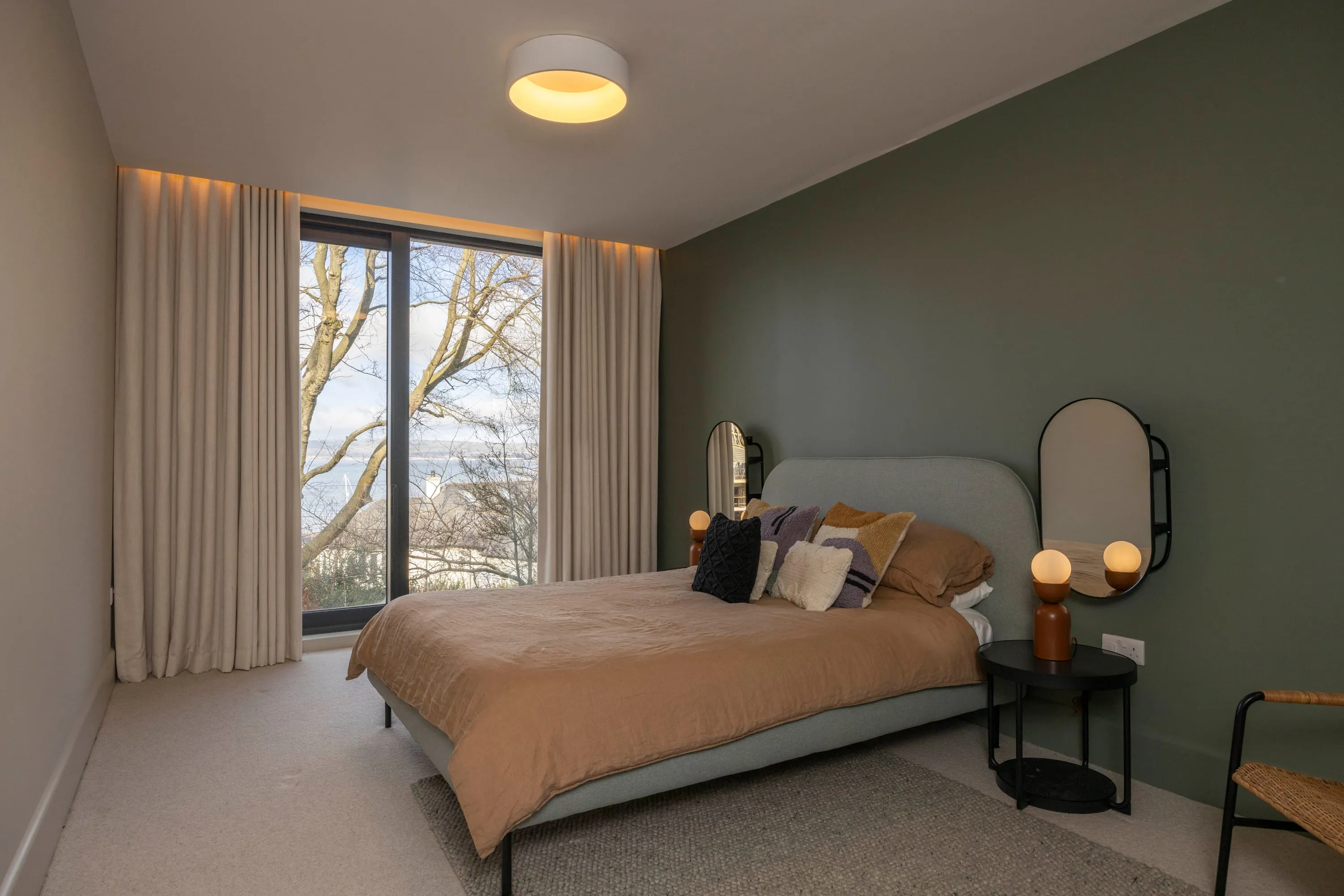 Bedroom two with window to the trees