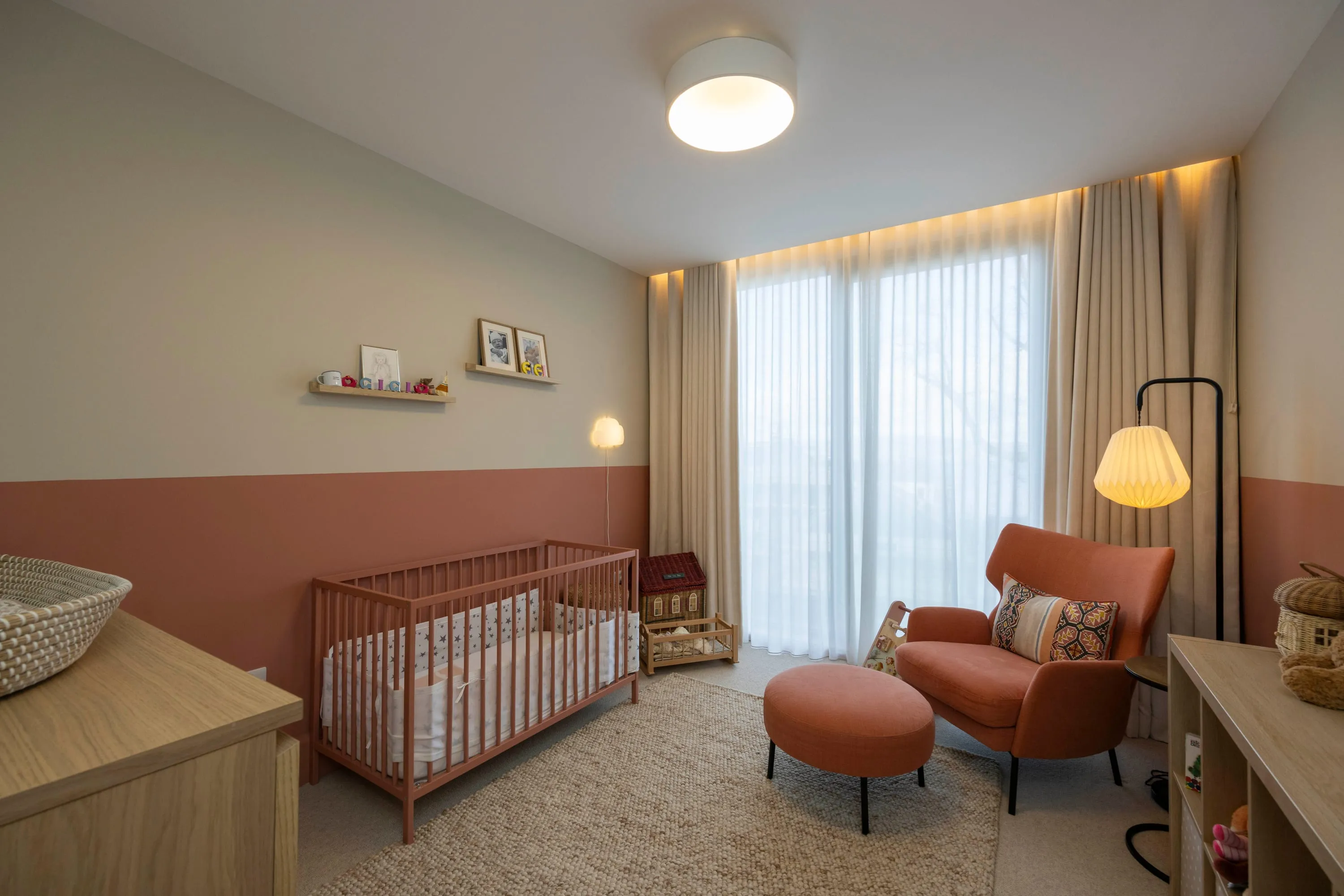 Bedroom three, currently a nursery, with terracotta wall