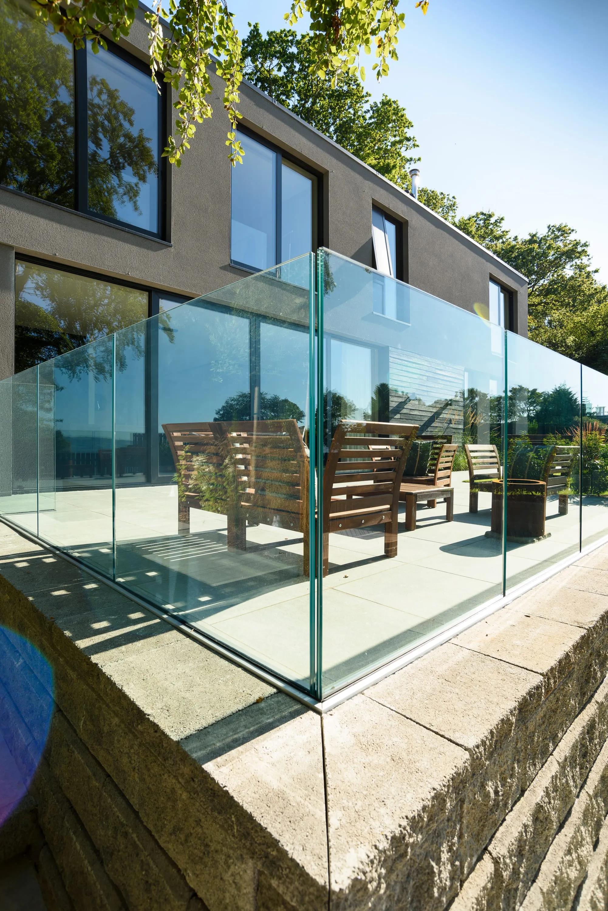 Glass balustrade on the terrace with the lough beyond