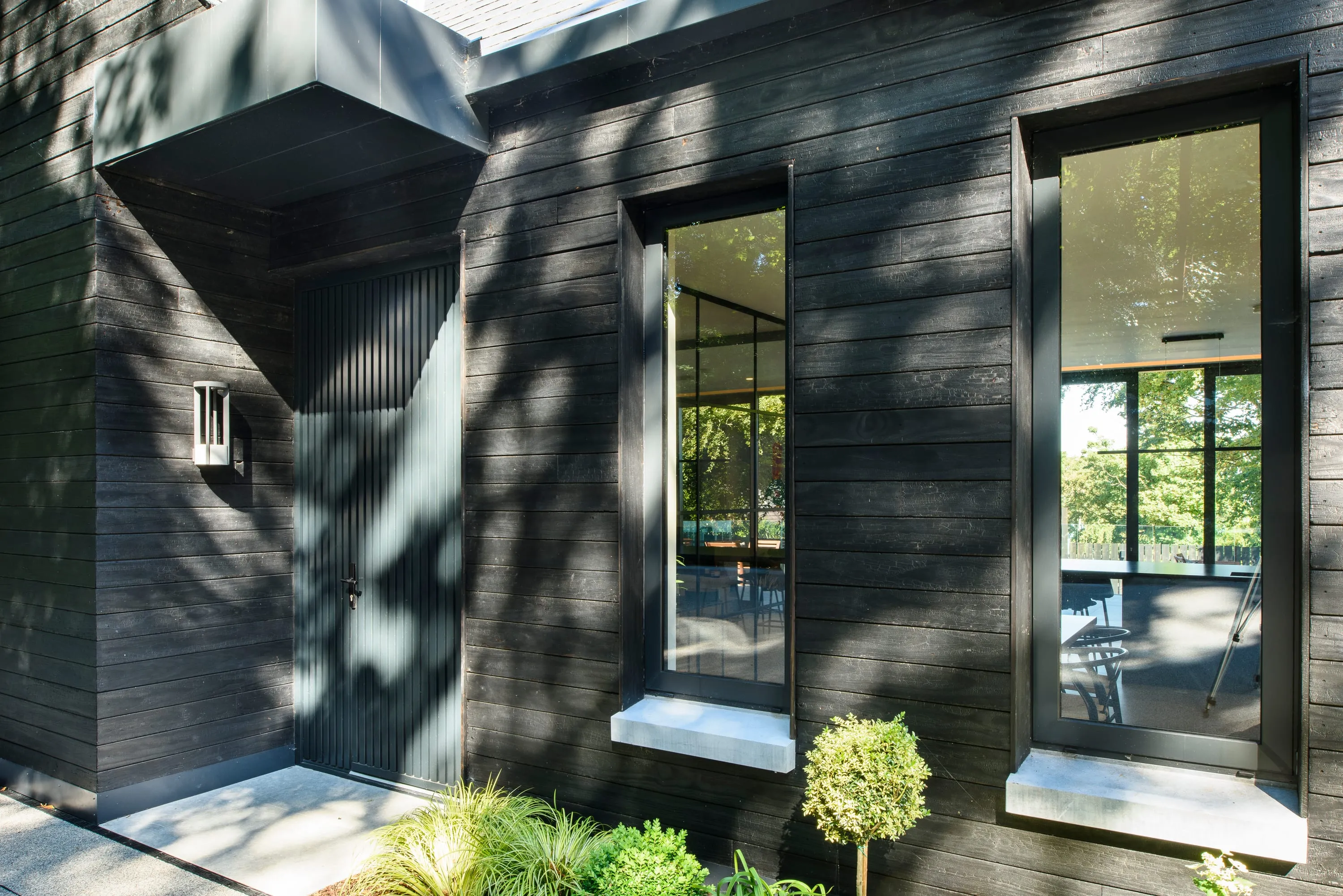 Corner of the rear elevation, timber and glazing