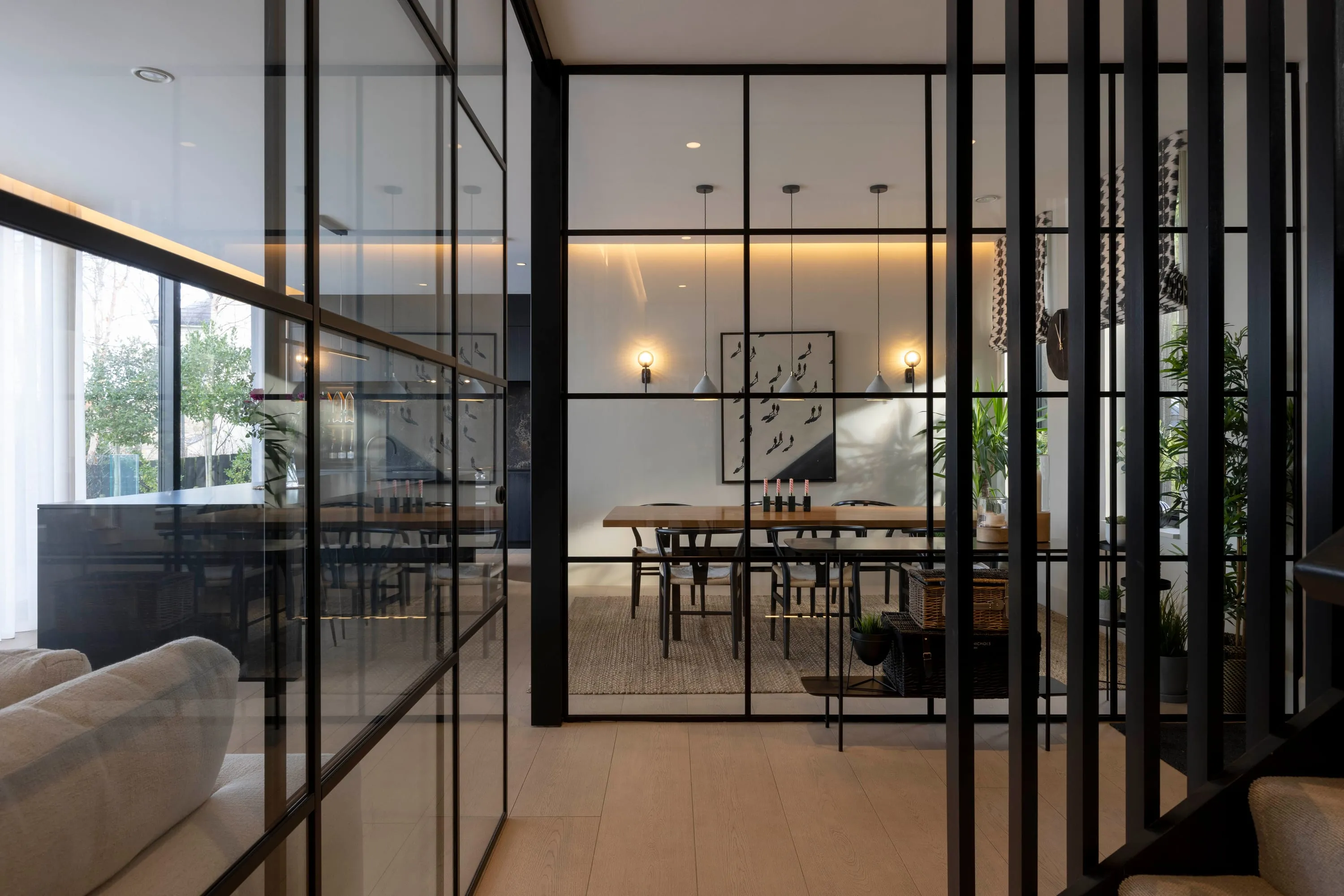 Glazed partition between the hall and the dining area