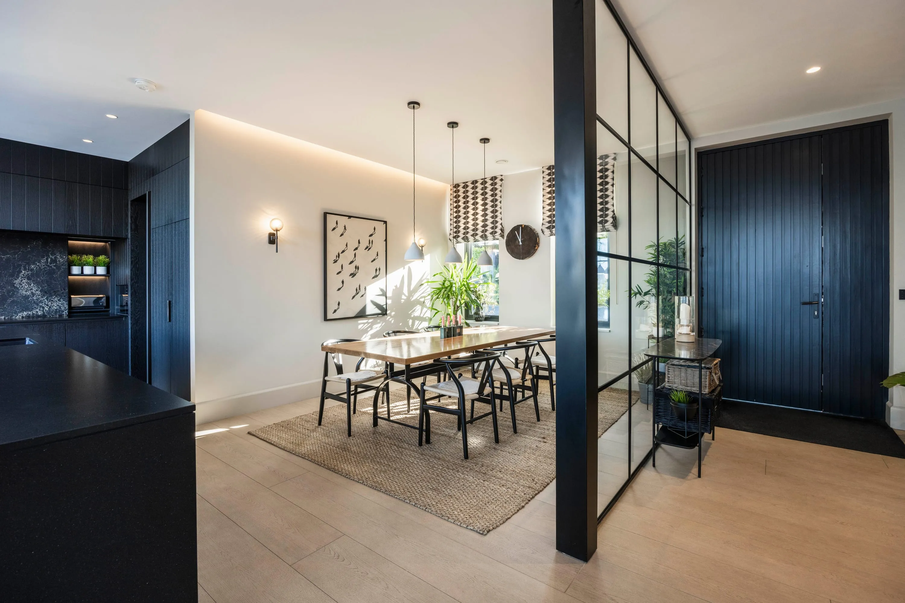 Dining area with the glazed screen to the hall