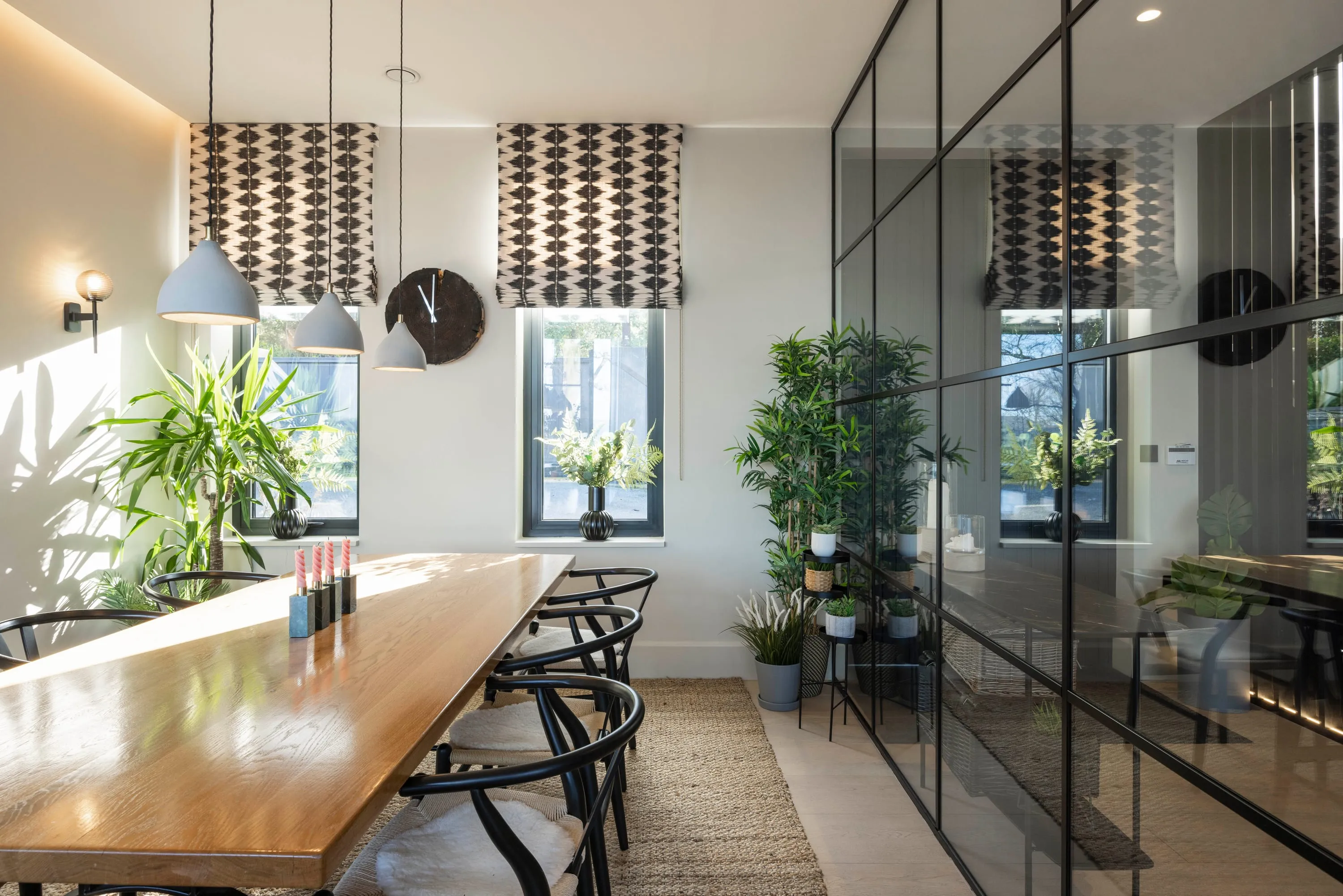 Dining table with the glazed partition beyond