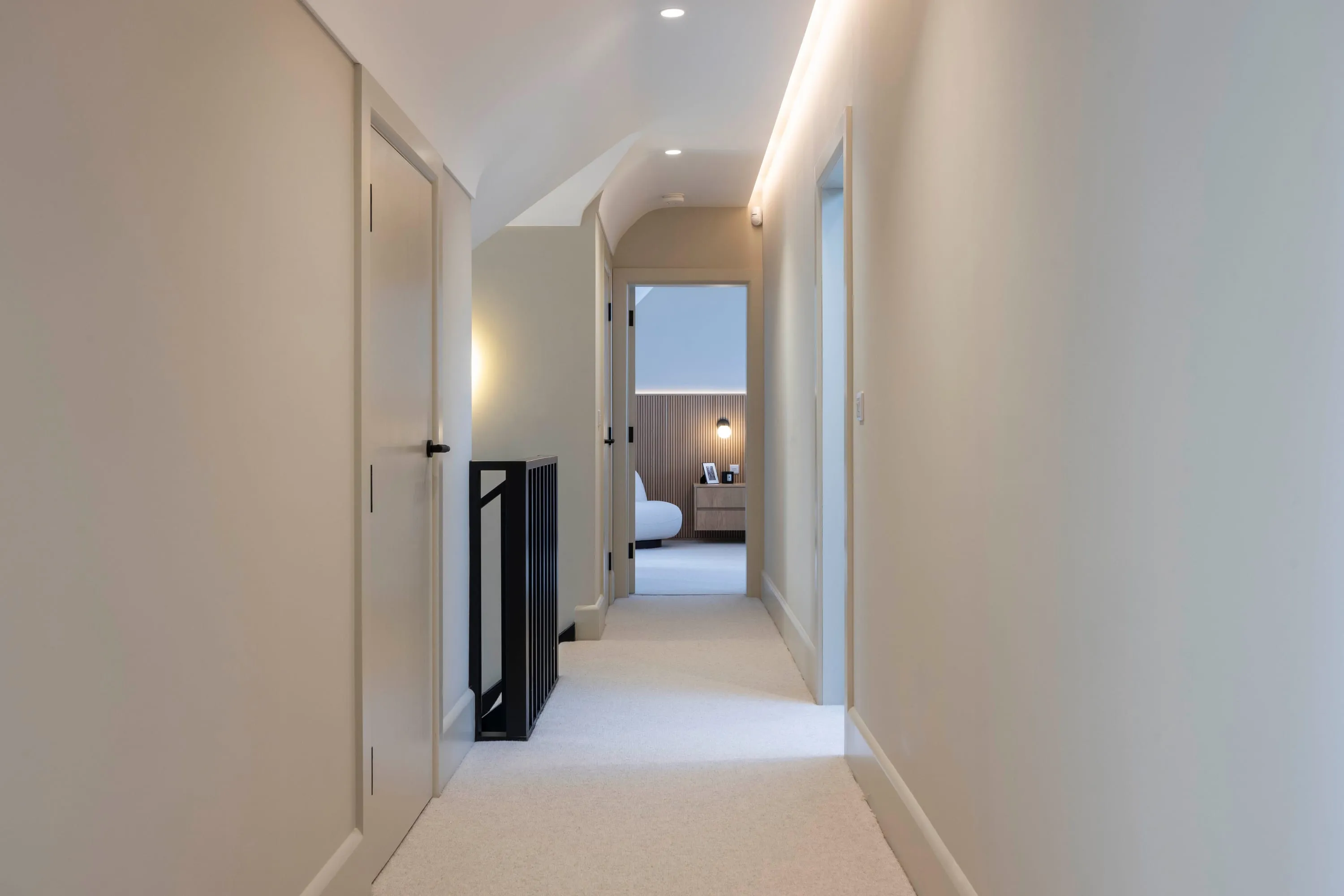 First-floor landing with the black stair screen