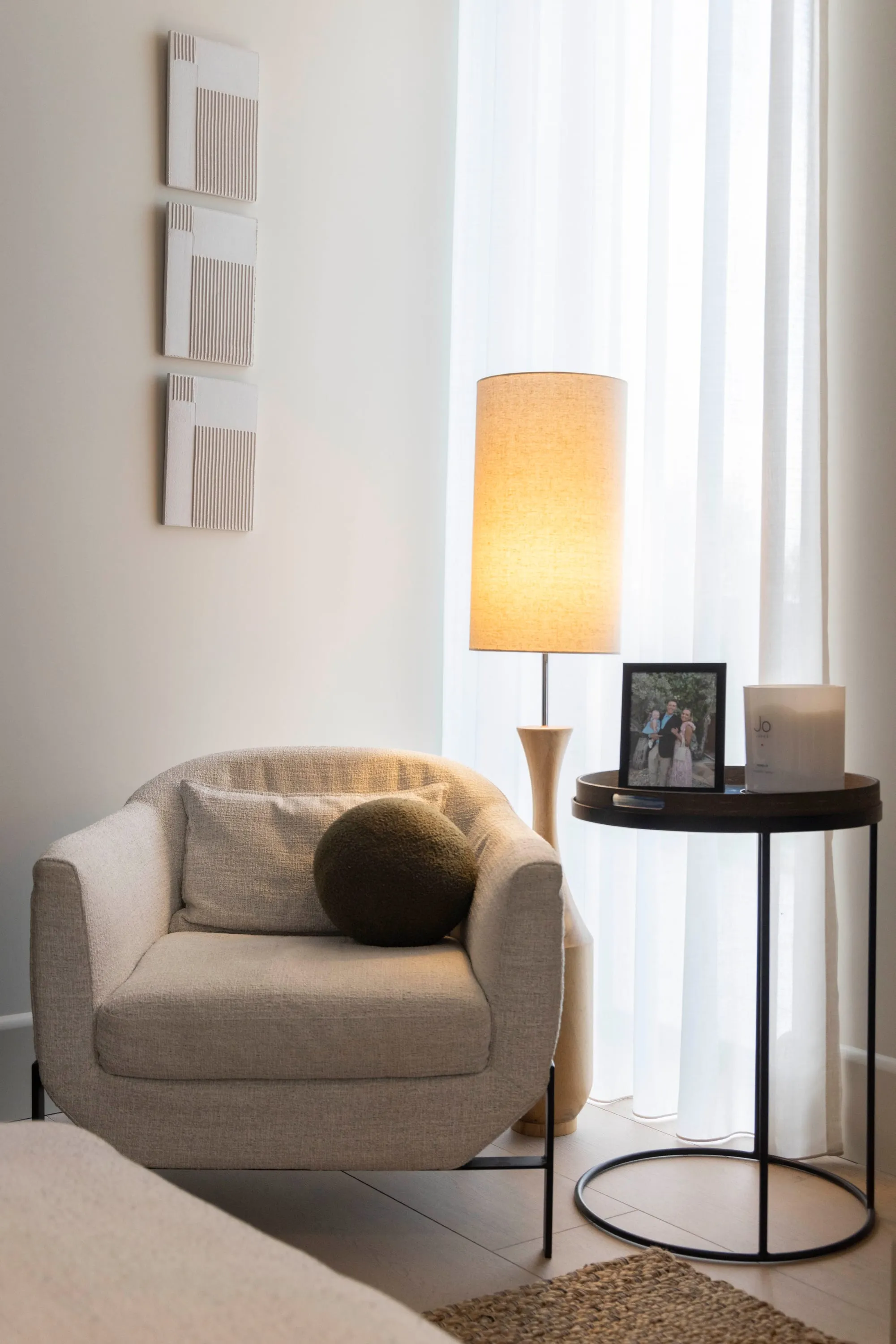 Armchair and lamp by the window